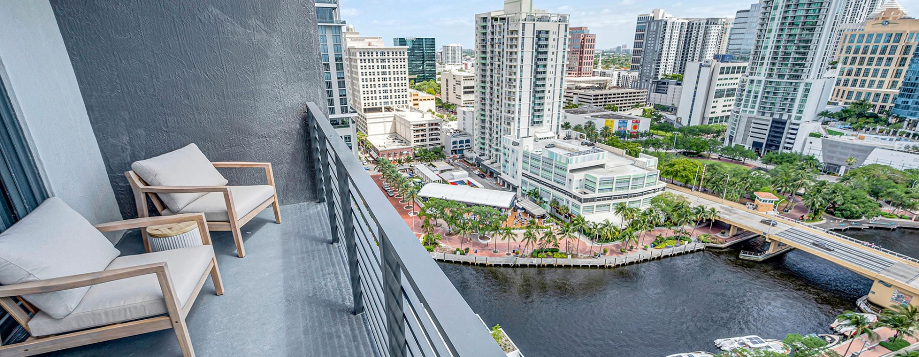 a view of a city with a river from a balcony